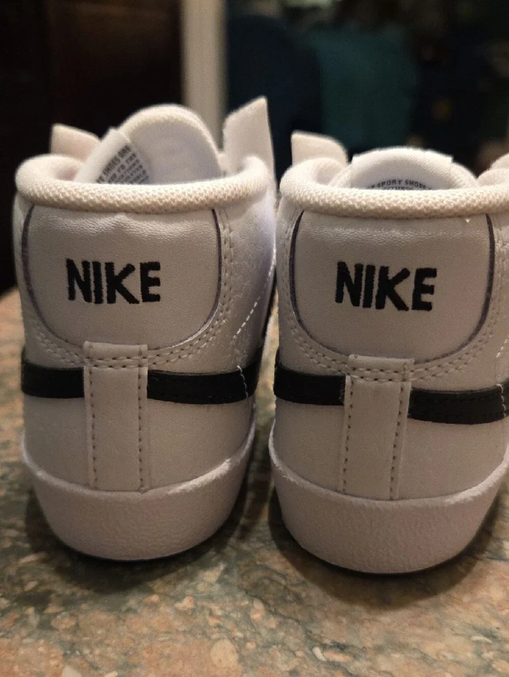 Nike Kids White High-Top Sneakers with Black Swoosh